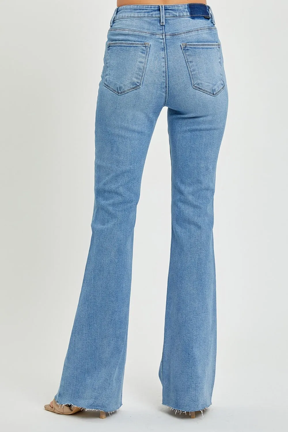 Risen High Rise Raw Hem Bootcut Jeans