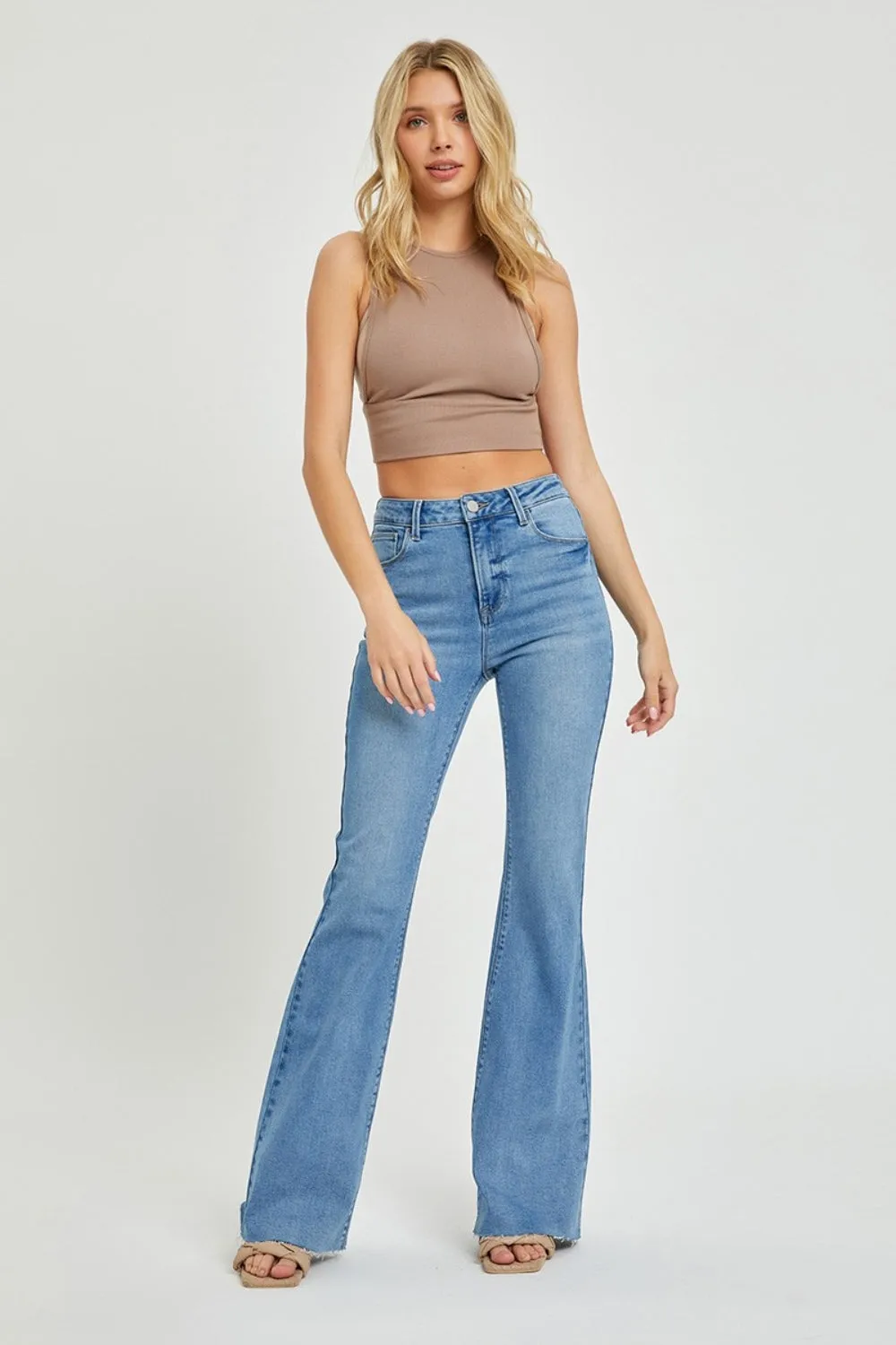 Risen High Rise Raw Hem Bootcut Jeans